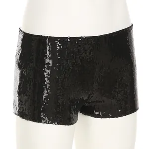Detailed macro view of black sequined low-waist slim-fit hot pants on white mannequin