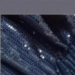 Detail shot of navy blue sequin fabric for fashionable low-waisted slim fit hot pants