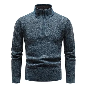 Front view of a blue textured knit men's sweater with a stand collar and zipper detail.