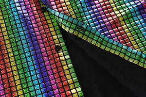 Close-up of rainbow sequin grid pattern on shiny men's cosplay button-down shirt