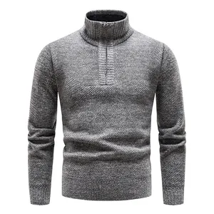 Close-up front view of a men's grey textured knit sweater with half-zip stand collar.