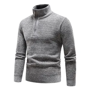 Detailed view of a premium grey textured knit sweater with half-zip stand-up collar