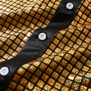 Close-up of shiny gold grid pattern and black button-down placket of cosplay shirt