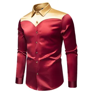 Dettaglio di una lussuosa camicia in raso bicolore rosso e oro a maniche lunghe.