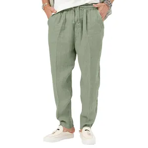 Volledig zicht op de saliegroene katoenen linnen vrijetijdsbroek voor heren met trekkoord
