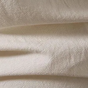 Macro della trama del tessuto in lino traspirante crema per camicia da spiaggia casual uomo