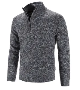 Close-up detail of grey speckled men's quarter-zip knitted stand collar sweater