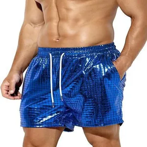 Detail view of metallic blue checkered men's beach shorts with elastic drawstring waist
