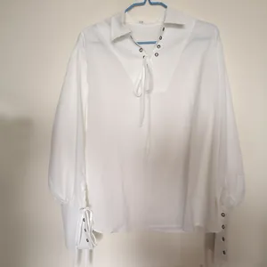 Medieval retro men's white loose lace-up shirt with metallic eyelet details for performance