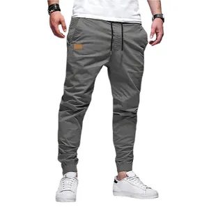Pantaloni jogger cargo grigi da uomo con coulisse e polsini elastici per sport