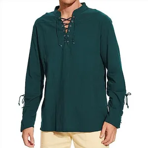 Detail view of men's Renaissance pirate shirt with lace-up chest and dark green fabric