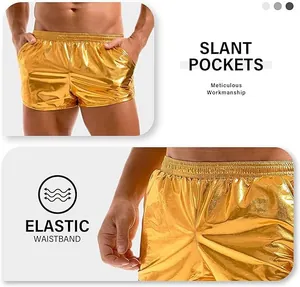 Detail of shiny golden men's shorts with slant pockets and elastic waistband