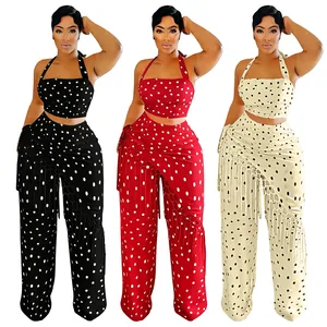 Ensemble deux pièces élégant avec haut court à pois et pantalon large à franges en trois couleurs