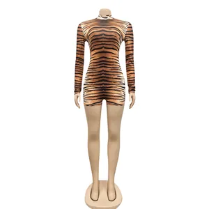Sexy tiger print long sleeve bodycon bodysuit for women on a mannequin display