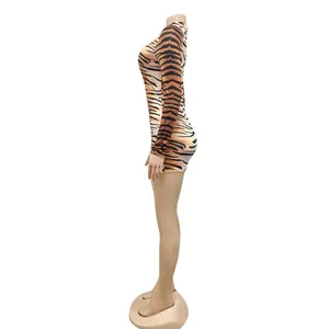 Detailed side view of sexy long sleeve tiger print bodysuit displayed on a mannequin