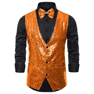 Close-up detail of a bright orange sequined stage vest with a matching bow tie for men