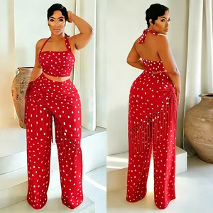 Ensemble deux pièces rouge à pois tendance avec haut licou et pantalon large à franges