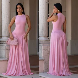 Elegant pink sleeveless maxi dress featuring a round neck and pleated flowy skirt detail