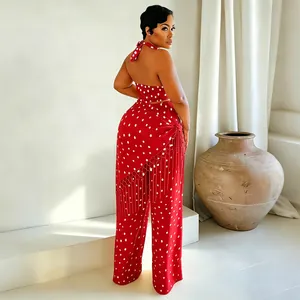 Magnifique ensemble deux pièces rouge à pois blancs avec détails franges sur le pantalon