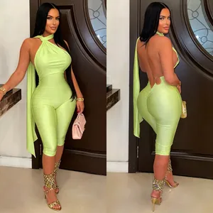 Close-up detail showing front and back views of a sexy backless lime green halter jumpsuit