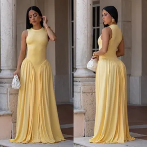 Elegant pale yellow sleeveless maxi dress with pleated skirt detail