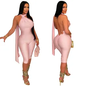 Detailed views showing the front and back of a sexy pink halter neck backless jumpsuit