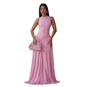 Elegant pink sleeveless round neck maxi dress with pleated skirt and woven clutch bag