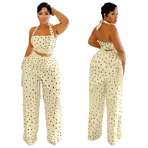 Élégant ensemble deux pièces à pois avec haut dos nu et pantalon large à franges