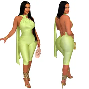 Detailed front and back view of sexy neon green backless halter jumpsuit for women