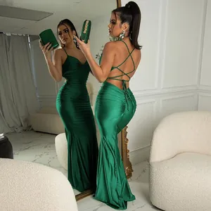 Detail showing the backless lace-up design of this sexy emerald green bodycon maxi dress.