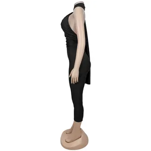 Detailed side profile of a sexy black backless slim-fit jumpsuit on a display mannequin.