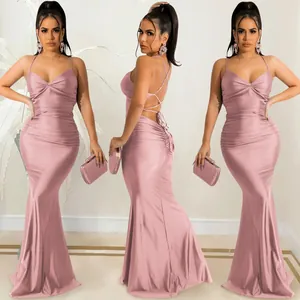Front and back views of a sexy pink backless spaghetti strap bodycon mermaid maxi dress