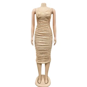 Elegant champagne gold sequin bodycon dress with spaghetti straps and ruched detailing