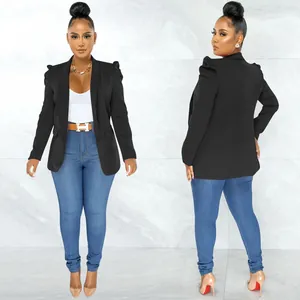 High-quality detail shot of a black puff-sleeve blazer jacket for stylish women.