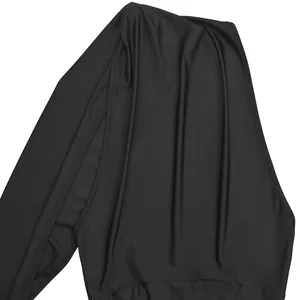 Close-up of black solid color backless bodycon jumpsuit fabric with elegant draping detail