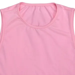 Close-up of pink sleeveless dress showing round neckline and smooth fabric texture