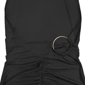 Close-up detail of sexy black backless bodysuit with gold ring and ruched design.