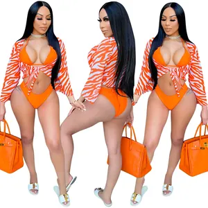 Sexy orange zebra print three-piece bikini set including mesh cover-up top and high cut bottoms