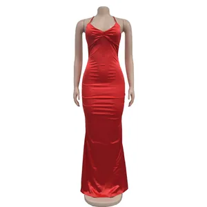 Front view of a vibrant red halter neck backless bodycon maxi dress on a mannequin