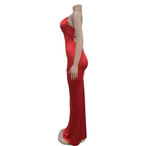 Detailed side view of an elegant red backless bodycon maxi dress on a mannequin