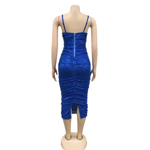 Detailed back view of a royal blue sequined bodycon midi dress with a zipper and slit