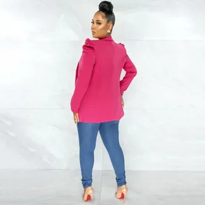 Detailed rear view of a vibrant magenta long sleeve puff shoulder blazer for women