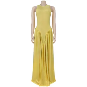 Sleeveless round neck yellow maxi dress with pleated skirt on display mannequin