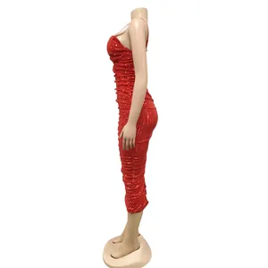 Side profile of a sparkling red sequin bodycon maxi dress with spaghetti straps