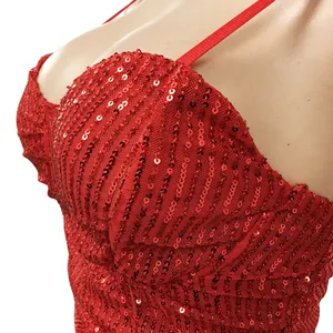 Detailed macro view of the red sequined pattern on a sexy nightclub evening dress
