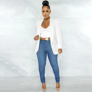 Elegant white long sleeve blazer with puffed shoulders for a sophisticated feminine look.