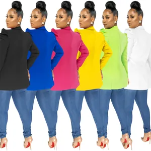 Macro view of women's puff sleeve blazers available in six vibrant colors for detail