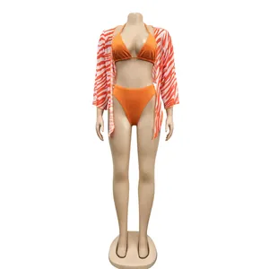 Sexy orange three-piece bikini set with a zebra print sheer mesh cover-up kimono