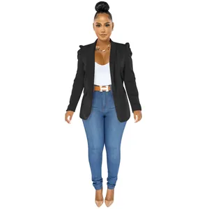 Detailed view of women's black pleated long sleeve blazer with puffed shoulders