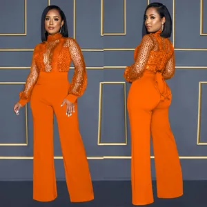 Combinaison orange à manches longues pailletée avec pantalon large